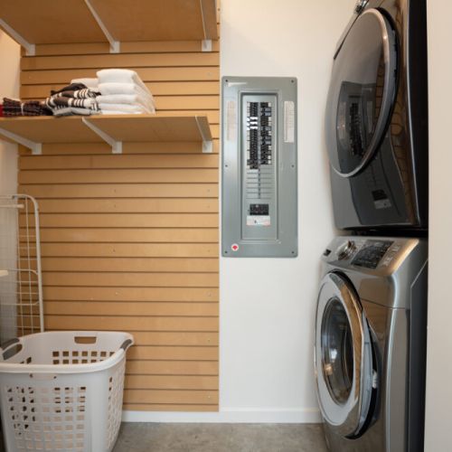 Full laundry facilities can be found near the bedrooms.