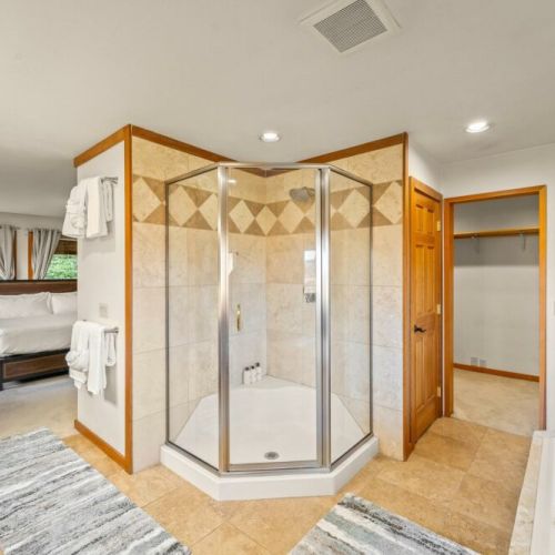 Primary bathroom with separate tub and shower