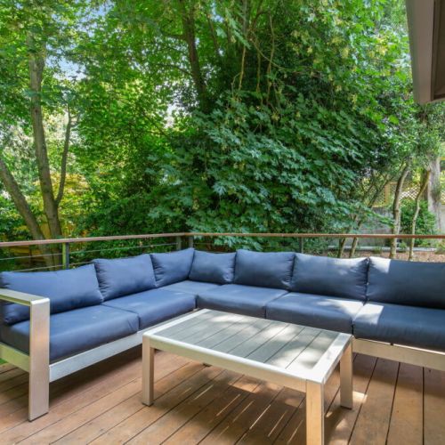 Take a seat, breathe in the fresh air, and let our backyard deck become your favorite spot to unwind.