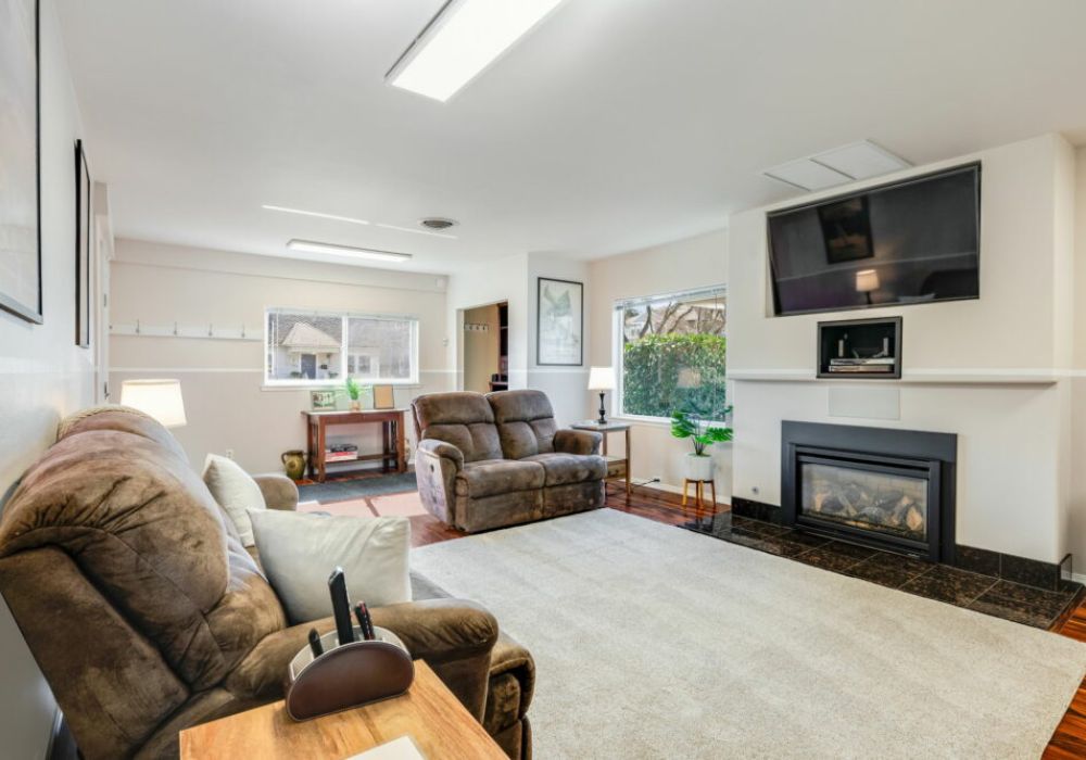 A large living room with comfortable seating awaits! Cable TV and streaming included.