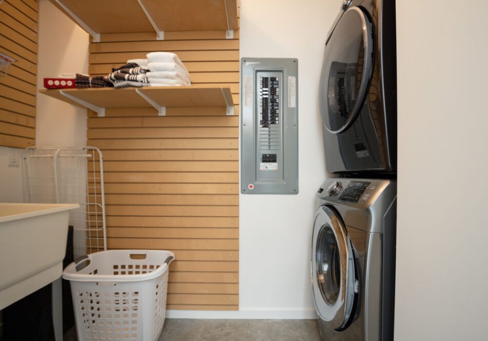 Full laundry facilities can be found near the bedrooms.
