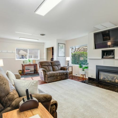 A large living room with comfortable seating awaits! Cable TV and streaming included.